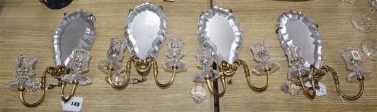 A set of four glass and ormolu two-branch girandoles